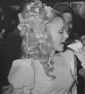 Sharon Tate eats cake at her 1968 wedding