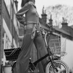 A-fashion-model-wearing-belted-jumpsuit-on-a-small-sized-bicycle-London.-UK-28th-May-1969.-Photo-by-Evening-Standard