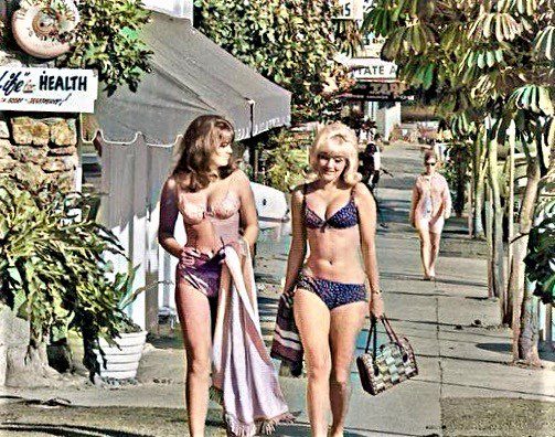 Bikini girls walking to the Beach