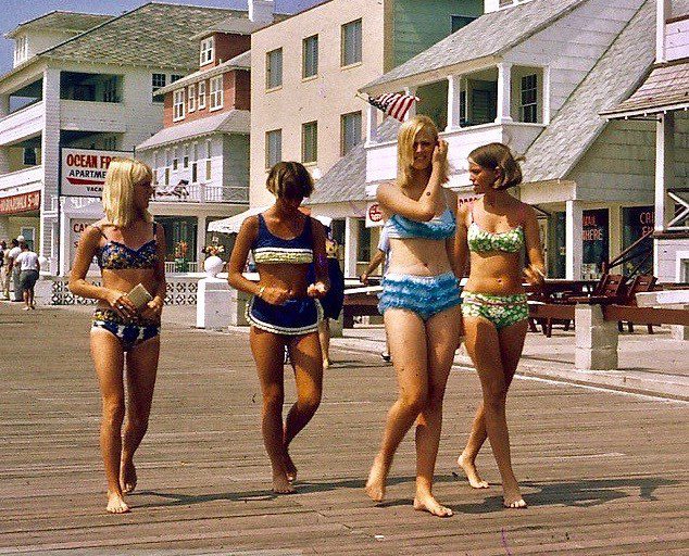 Walking the boardwalk in new their new bikinis