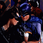 Catwoman and Batman share a soda