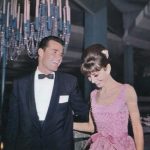 1961 James Garner & Audry Hepburn share a laugh at a dinner hosted by William Wyler at Romanoff’s Restaurant in Beverly Hills