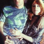 Jim Morrison and Pam Courson photographed by Raeanne Rubinstein at Themis boutique in Los Angeles, 1969.