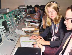 NASA Technical Specialist Frances ‘Poppy’ Northcutt speaks with a colleague in Mission Control during Apollo 11, July 1969.