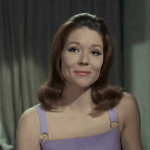 Emma Peel looks ready to party