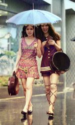 Caught in the rain in the Ginza district, Tokyo, Japan, 1969