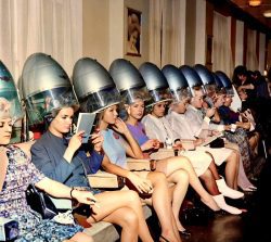 Contestants for the 1967 Miss World Contestants for the 1967 Miss World beauty pageant sit under hair dryers at a London salon, getting their final hairstyles done before the competition.