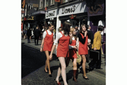 Shop girls on a break on 1960s Carnaby Street Shop girls on a break on 1960s Carnaby Street