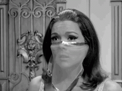 Diana Rigg i as Emma Peel in a sexy harem costume